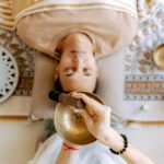 man relaxing while listening to sounds