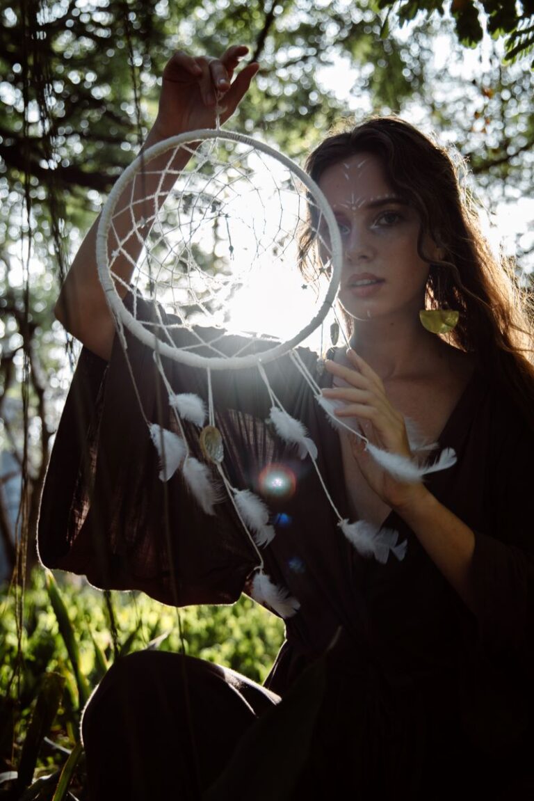 beautiful-woman-holding-a-dream-catcher