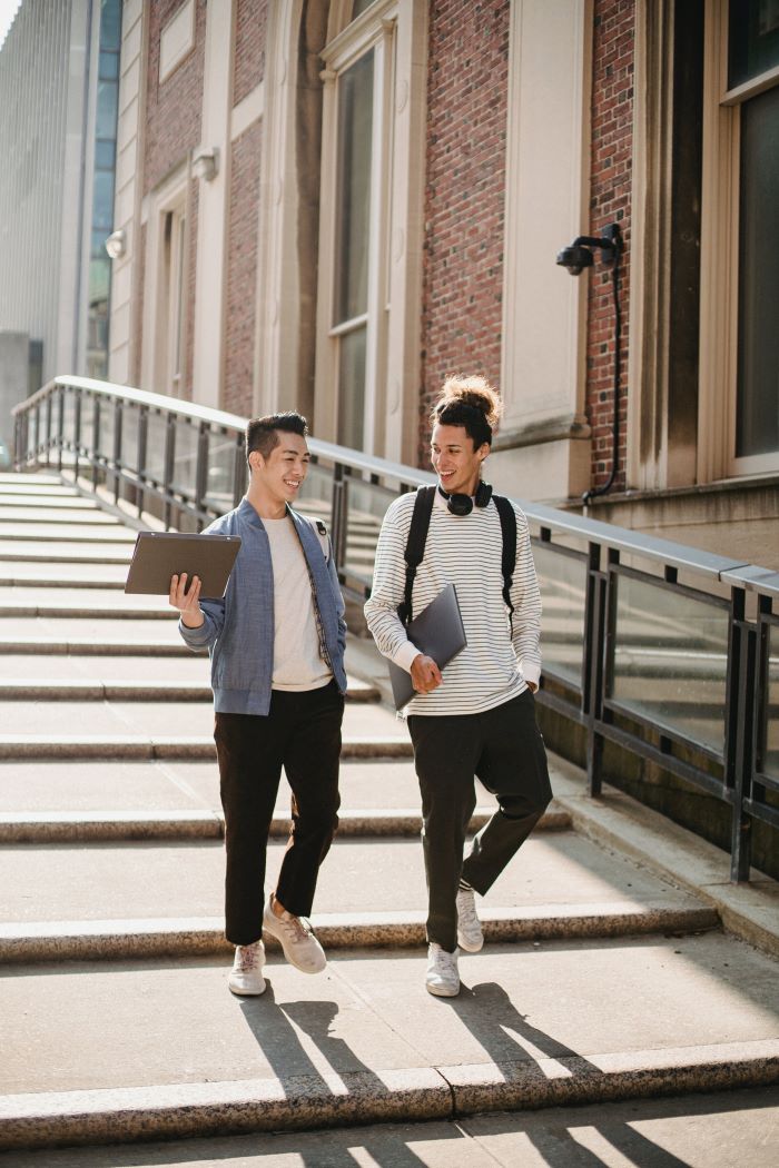 students walking along stairway in campus
