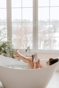 a-person-reading-a-book-in-a-bathtub