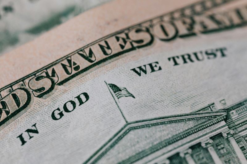 ten dollars with inscription of In God We Trust
