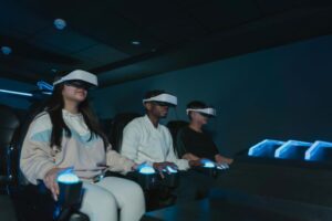 a group of people playing virtual reality glasses