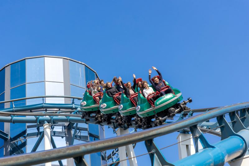 people on a roller coaster