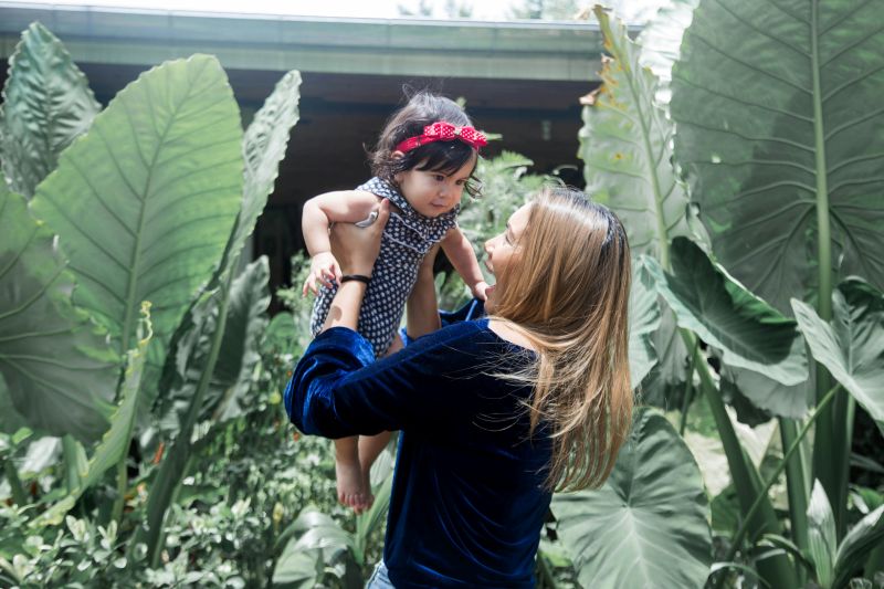 mother playing with kid